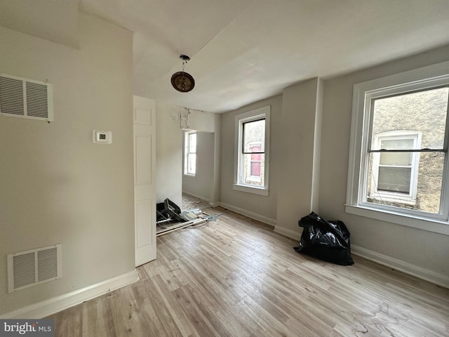 unfurnished room featuring light wood-type flooring