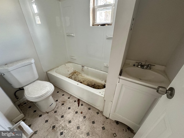 bathroom with toilet and vanity