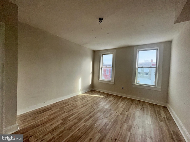 empty room featuring hardwood / wood-style floors