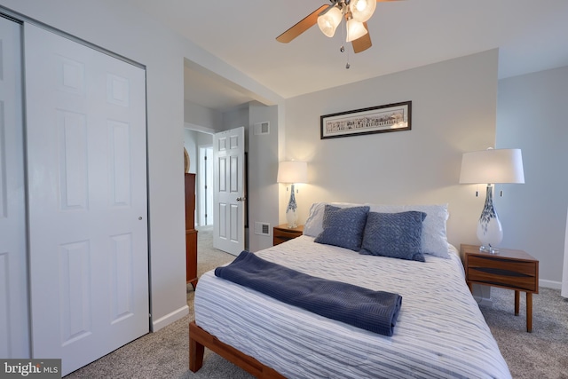 bedroom featuring ceiling fan and carpet