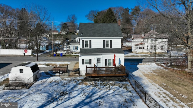 view of snow covered property