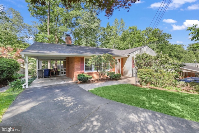 1113 Cameron Rd, Alexandria, VA 22308 - single story home featuring driveway, brick siding, a chimney, and an attached carport
