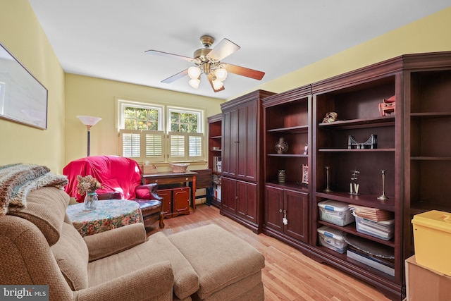 1113 Cameron Rd, Alexandria, VA 22308 - sitting room with light wood-style floors and ceiling fan