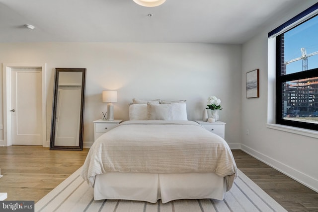 bedroom with light hardwood / wood-style flooring