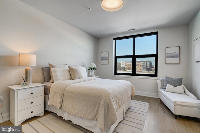 bedroom featuring light hardwood / wood-style floors