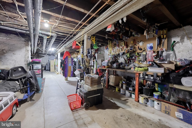 basement with a workshop area