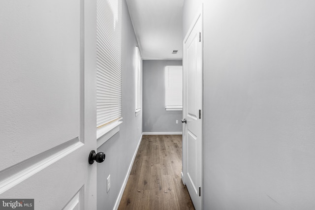 hallway featuring hardwood / wood-style floors