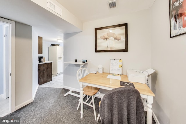 view of carpeted dining room