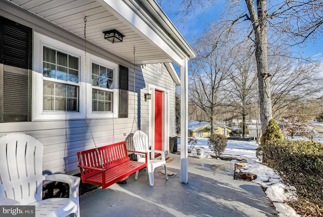 view of snow covered patio