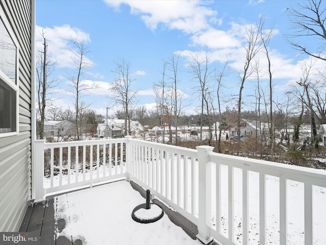 view of snow covered deck