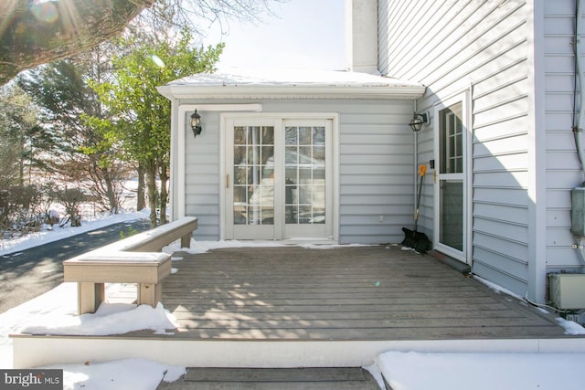 view of snow covered deck