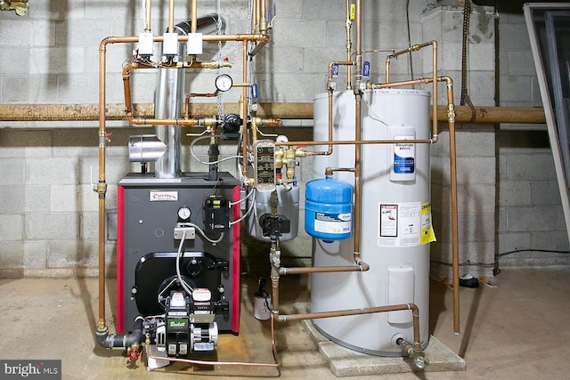 utility room featuring electric water heater