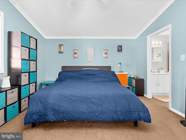 bedroom with crown molding, ensuite bath, light colored carpet, ceiling fan, and lofted ceiling