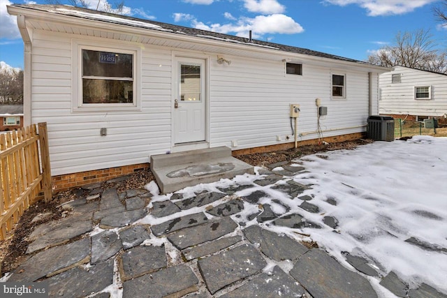 back of house featuring central AC