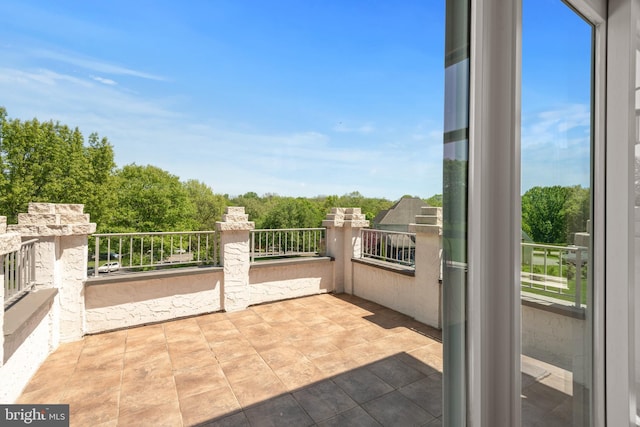 view of patio / terrace featuring a balcony