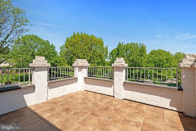 view of patio / terrace featuring a balcony