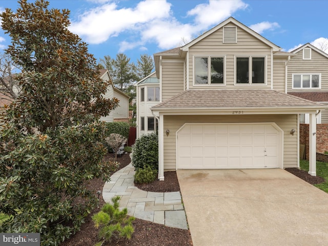 view of front of home with a garage