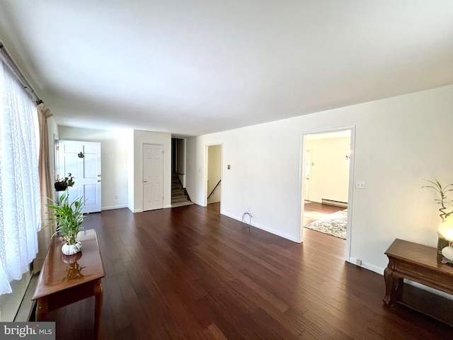 living room featuring dark hardwood / wood-style flooring