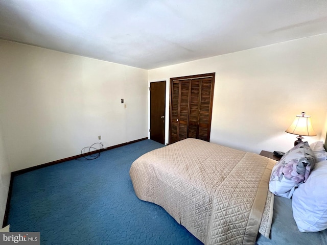 carpeted bedroom featuring a closet