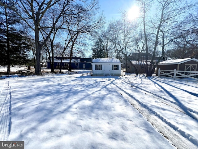 view of front facade featuring a shed