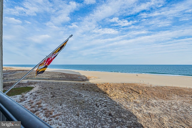 property view of water featuring a beach view