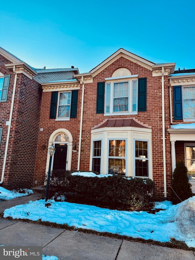 multi unit property featuring brick siding