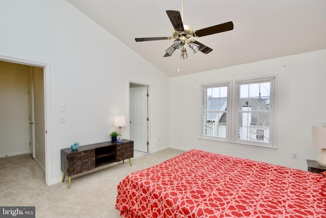 bedroom featuring ceiling fan, light colored carpet, baseboards, and high vaulted ceiling