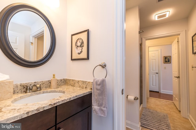 bathroom featuring vanity and tile patterned flooring