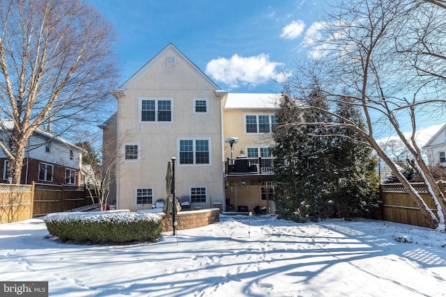 view of snow covered house