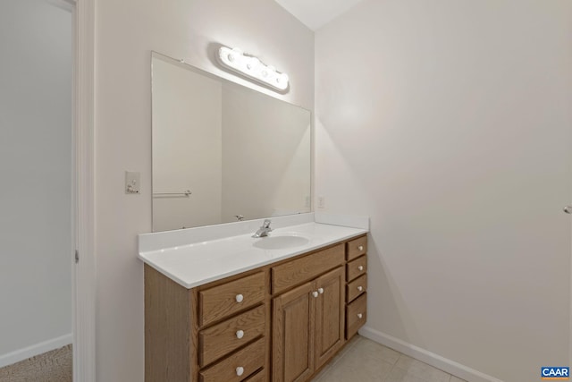 bathroom featuring vanity and tile patterned flooring