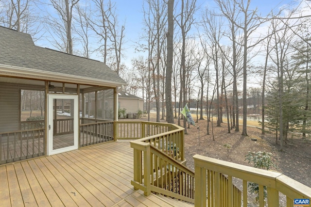 deck with a sunroom