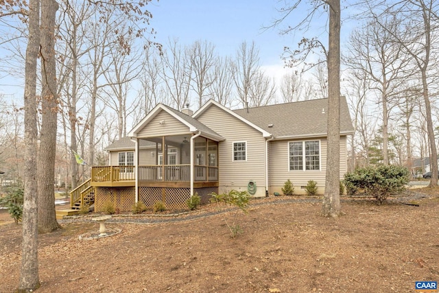 view of front of property featuring a deck and a sunroom