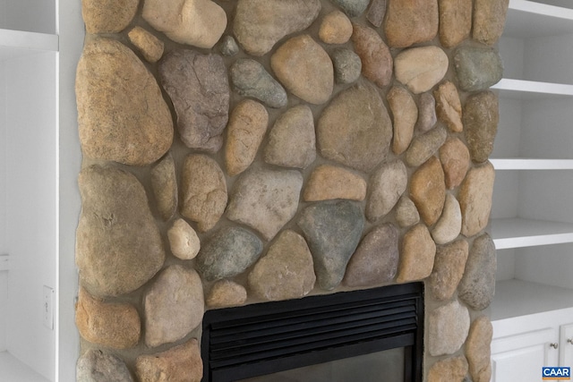 stairs featuring a fireplace