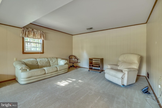 unfurnished living room with crown molding and carpet floors