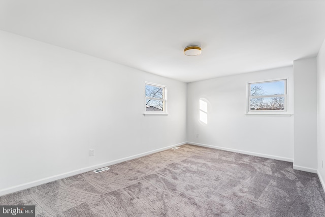 empty room featuring carpet