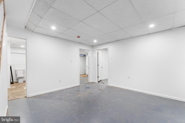 interior space featuring a paneled ceiling