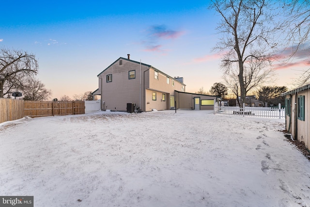 snowy yard with cooling unit