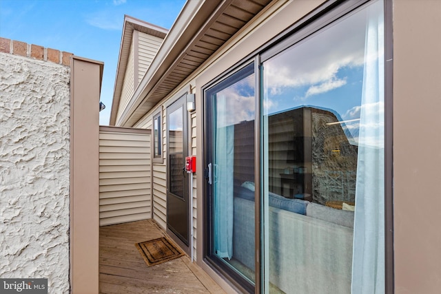 doorway to property featuring a balcony