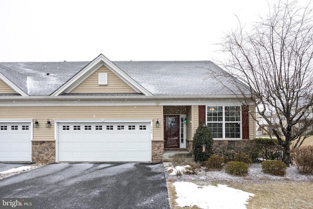 view of front of property featuring a garage