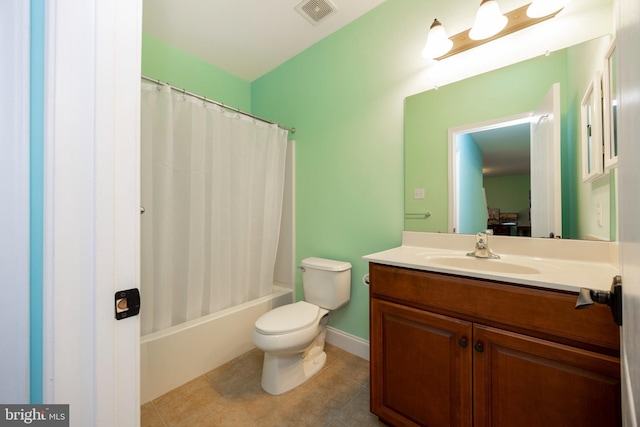 full bathroom with toilet, vanity, and shower / bath combo with shower curtain