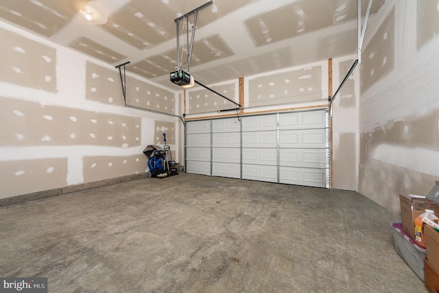 garage featuring a garage door opener