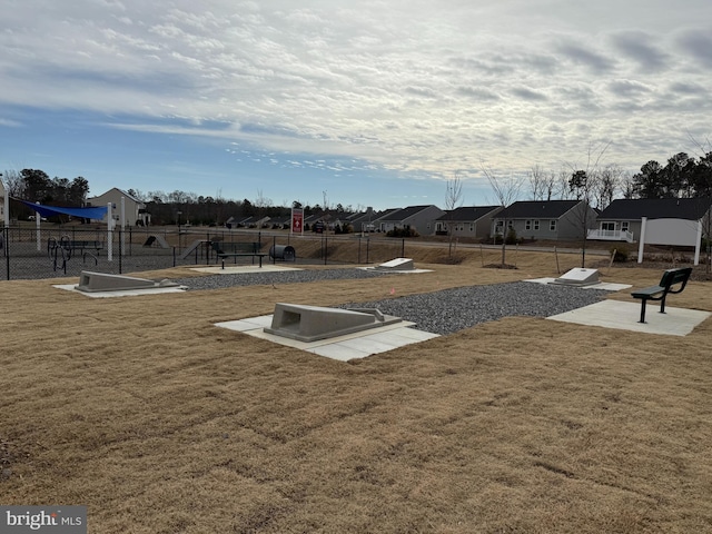 view of storm shelter with a yard