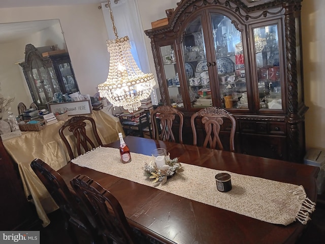 dining space featuring an inviting chandelier