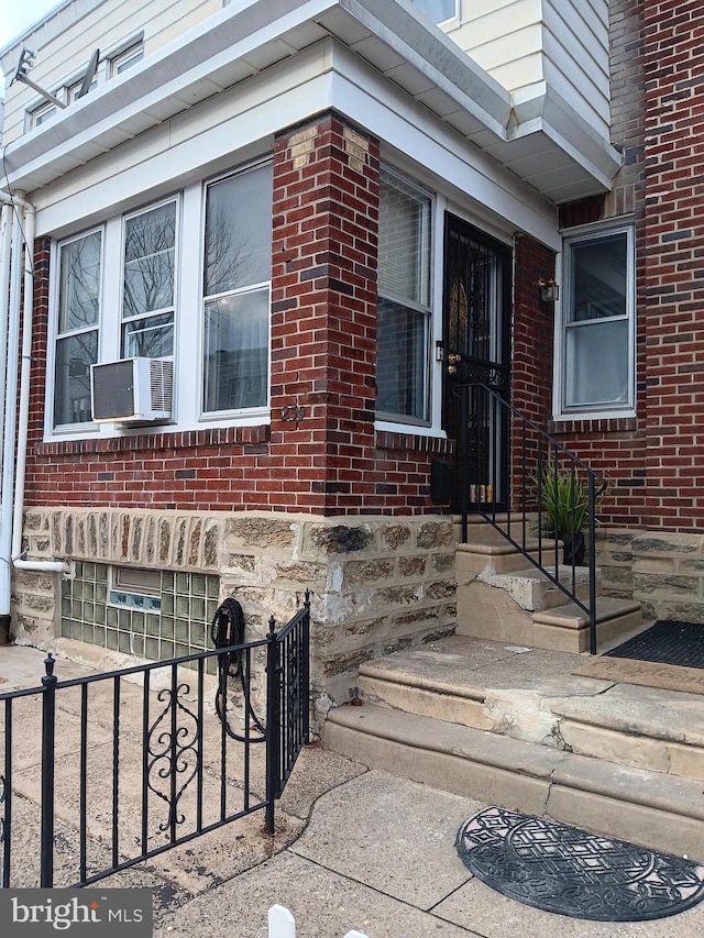 entrance to property with cooling unit