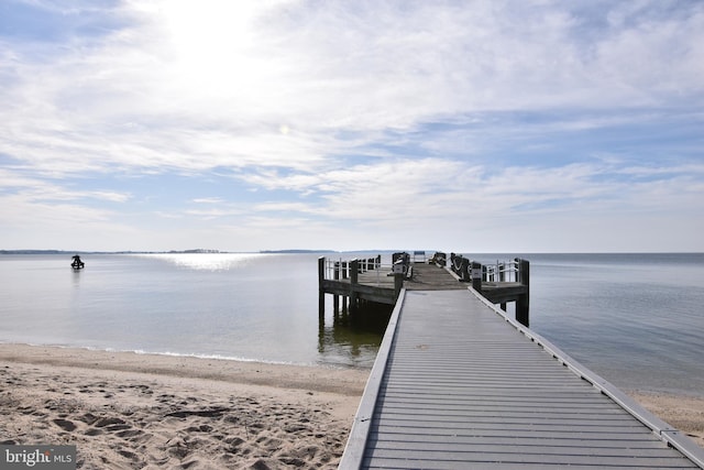 view of dock with a water view