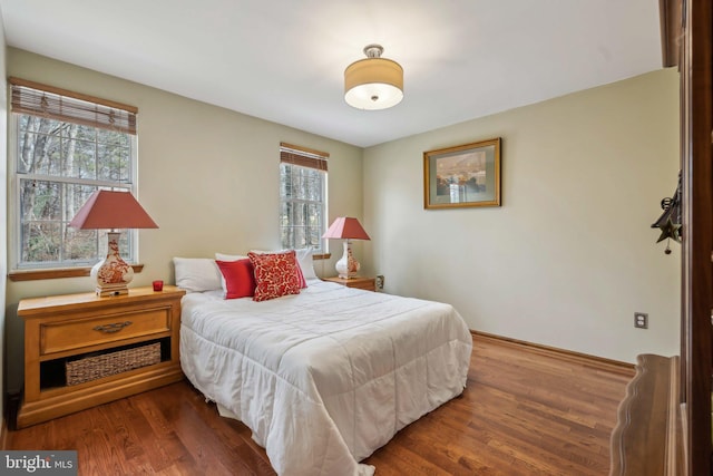 bedroom with wood finished floors