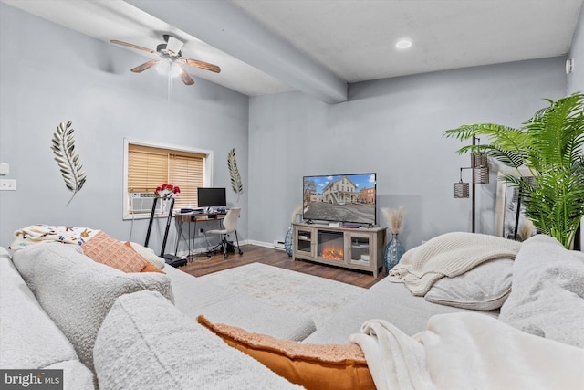 living room with dark hardwood / wood-style flooring, ceiling fan, cooling unit, and beamed ceiling