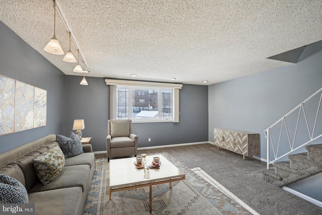 carpeted living room featuring a textured ceiling