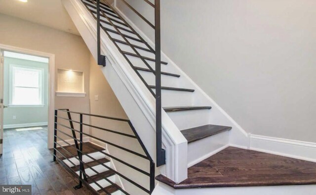 2312 Pierce St, Philadelphia, PA 19145 - staircase with wood finished floors and baseboards