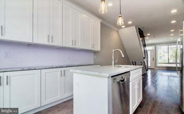 kitchen featuring white cabinetry, a kitchen island with sink, dishwasher, light stone countertops, and sink